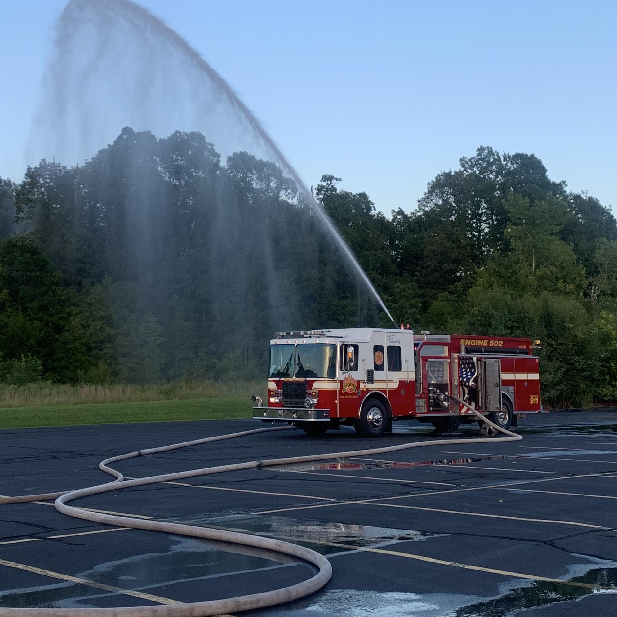 Photo of fire truck spraying water