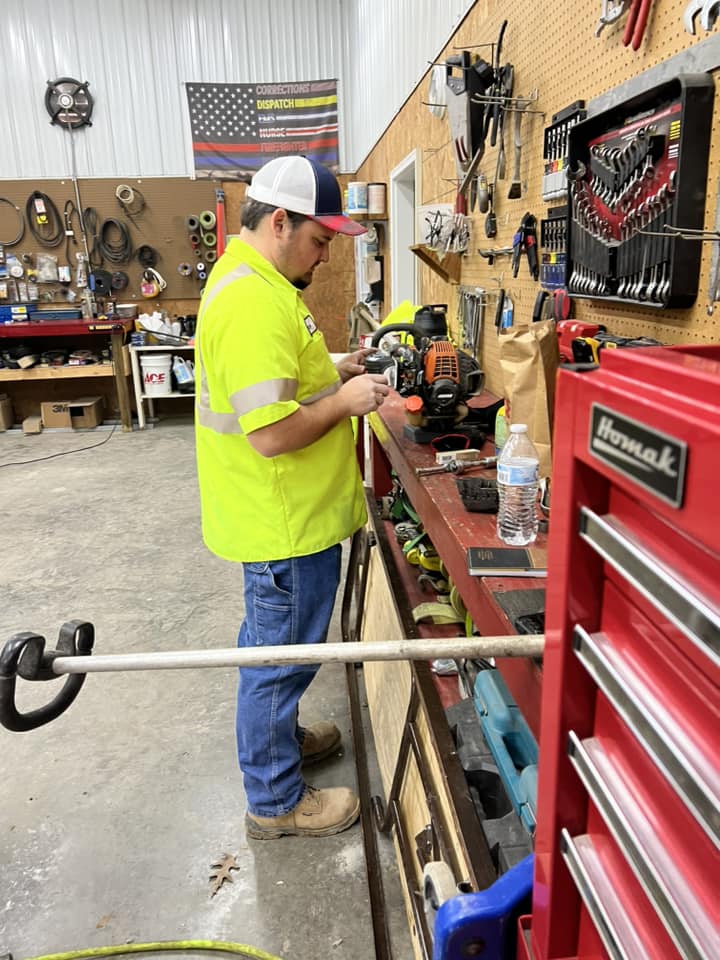 Photo of a public worker with tools