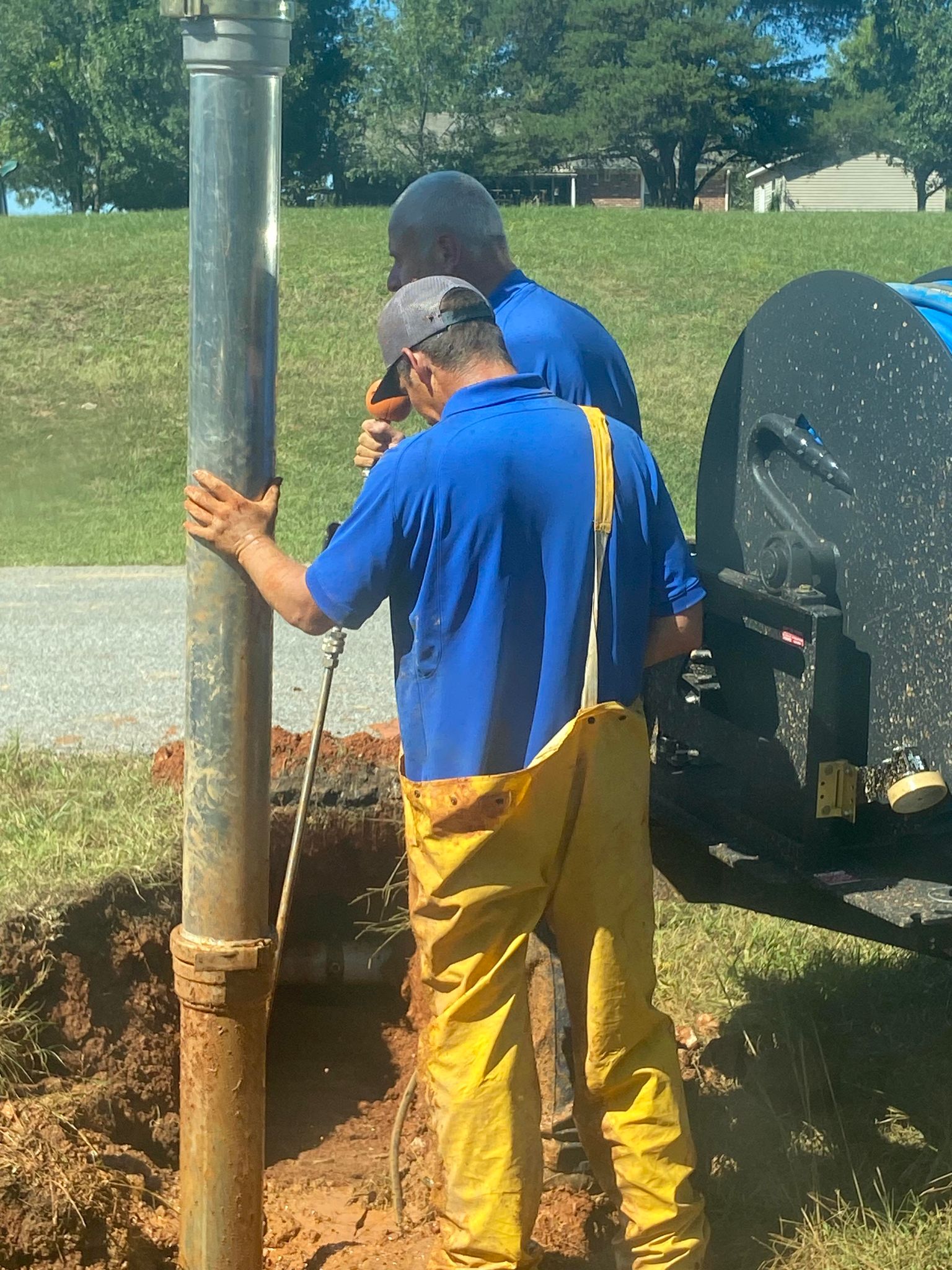 Photo of 2 water workers at work