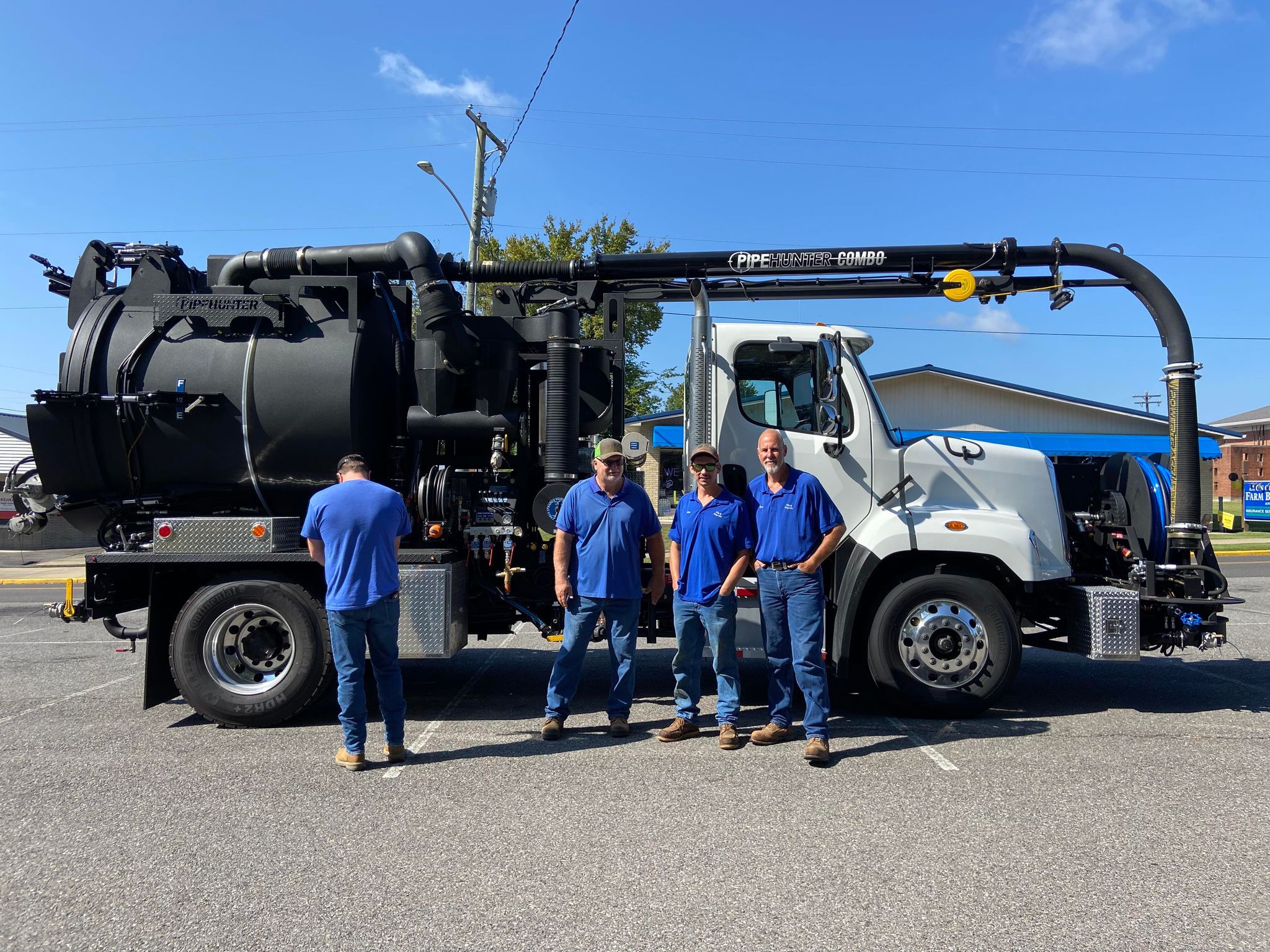 Photo of water workers by their truck