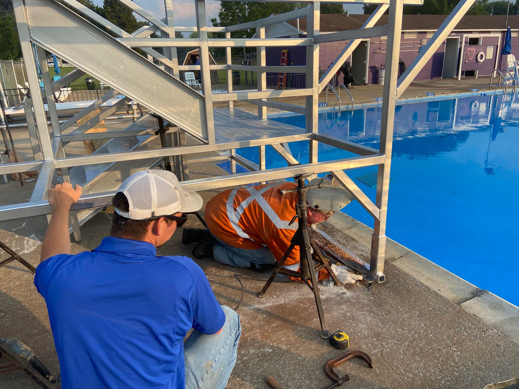 Photo of workers at the pool